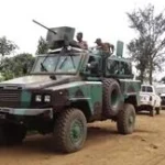 Soldats des Forces armées de la RDC (FARDC) en tenue de combat avec équipement militaire