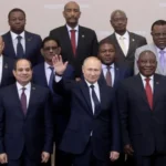 Vladimir Poutine entouré de dirigeants africains lors du sommet Russie-Afrique à Sotchi en 2019