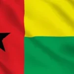 Drapeau de la Guinée-Bissau avec ses bandes horizontales rouge, jaune et verte et étoile noire